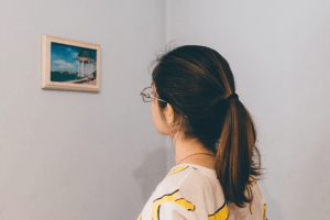 Woman at a Museum Looking at a Picture