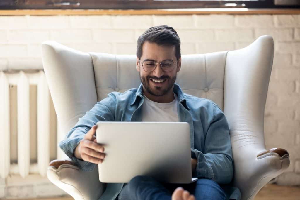 Man on His Computer Doing a Virtual Tour